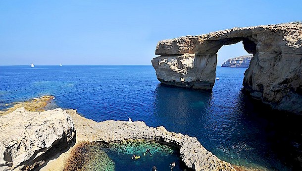 The Azure Window, a natural limestone arch which has served as a setting for several films and television series